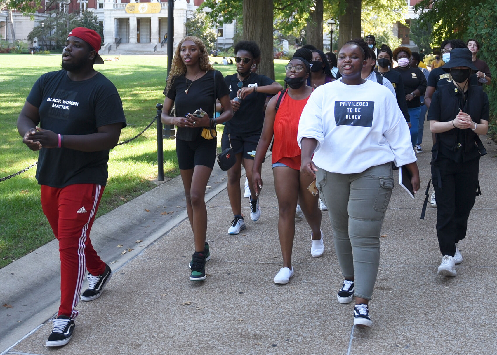 Isaiah Jackson, left, and Kiessence Bassett lead the crowd